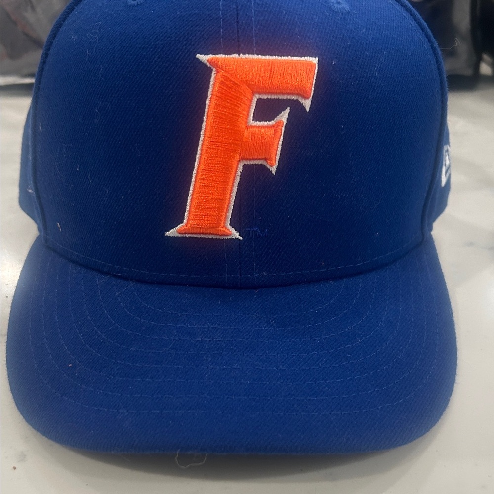 New Era Blue Cap with Orange Lettering